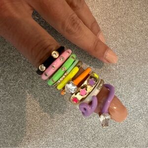 9 lightly worn gold fill neon enamel adjustable rings